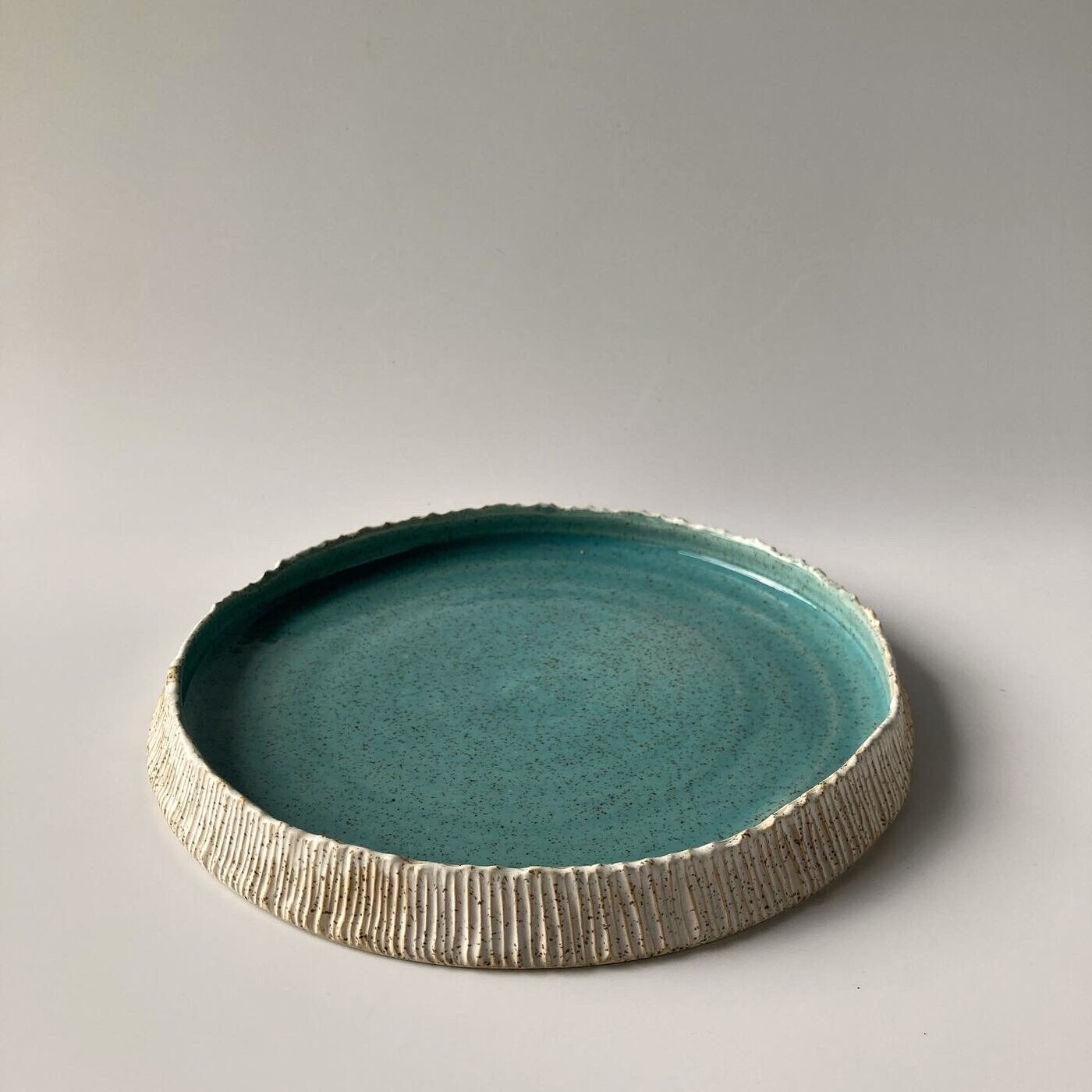 Ridged handmade stoneware plate by AWIS for AWIS