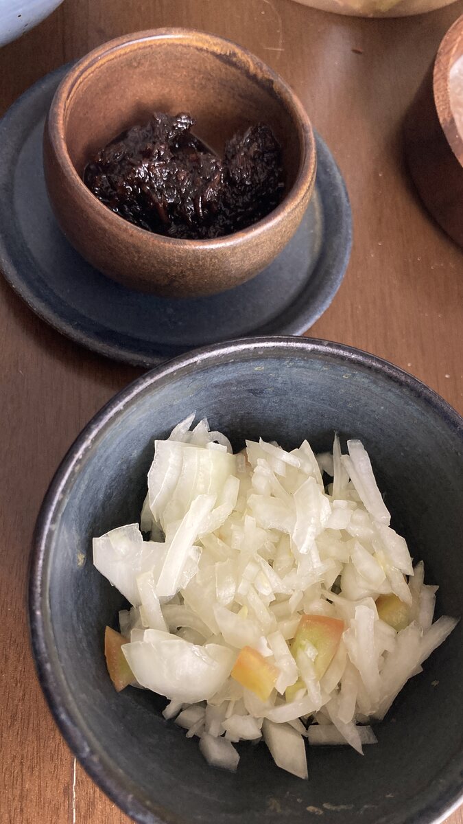 Side dishes in the pieces that hold them best. Handmade Philippine stoneware by AWIS in everyday use.
