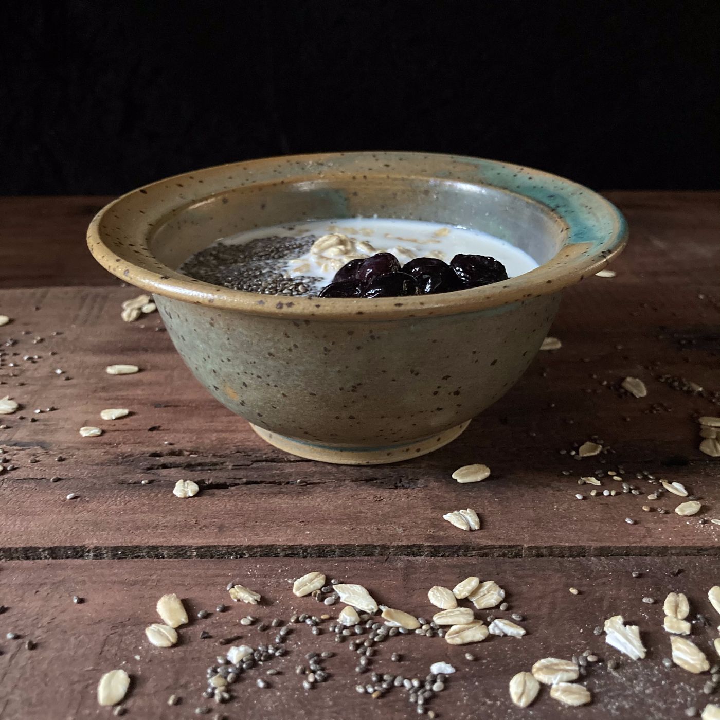 Handmade Philippine stoneware bowl styled with food, AWIS